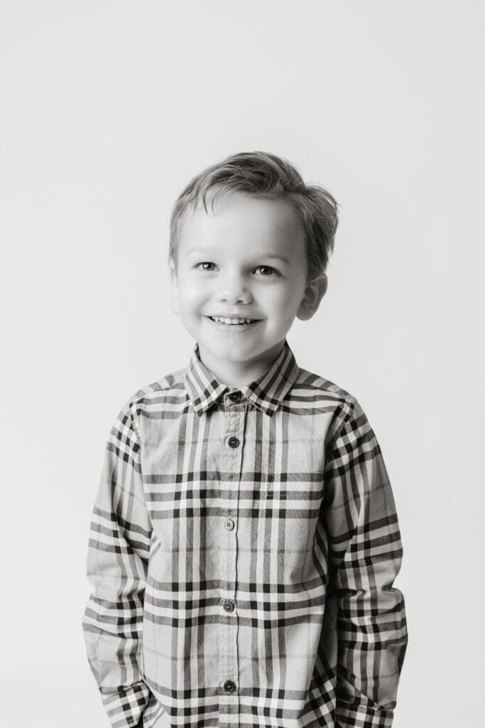 Black and white daycare portrait of smiling child 