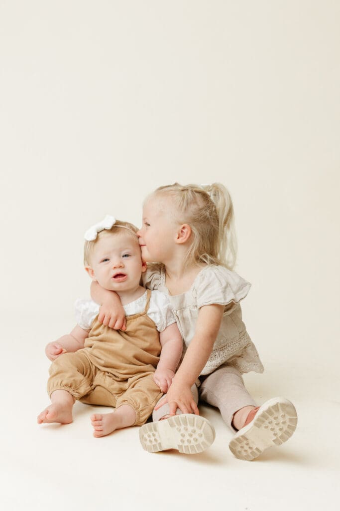 Preschool siblings photographed during daycare photo day session
