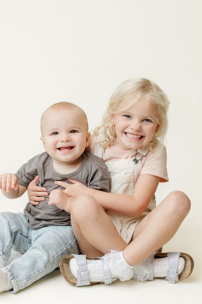 siblings smiling during daycare photo day