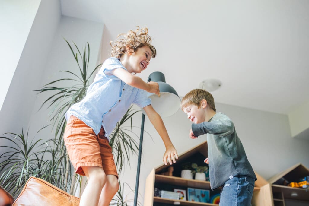 Vancouver children playing at home during in-home family session