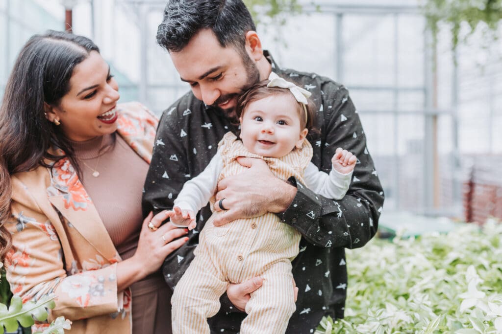 Father hugging his child during a natural family photography session in Vancouver