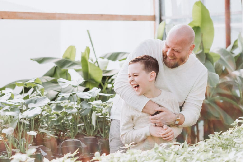 garden centre family photo of a father and son