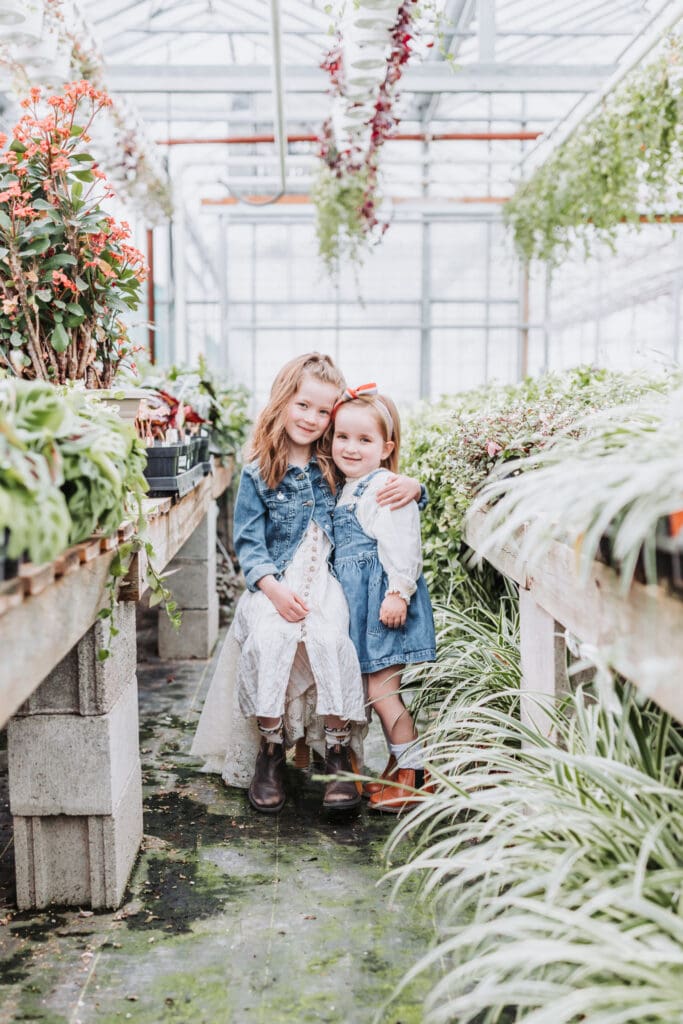 Lifestyle family photography session inside a bright Vancouver greenhouse