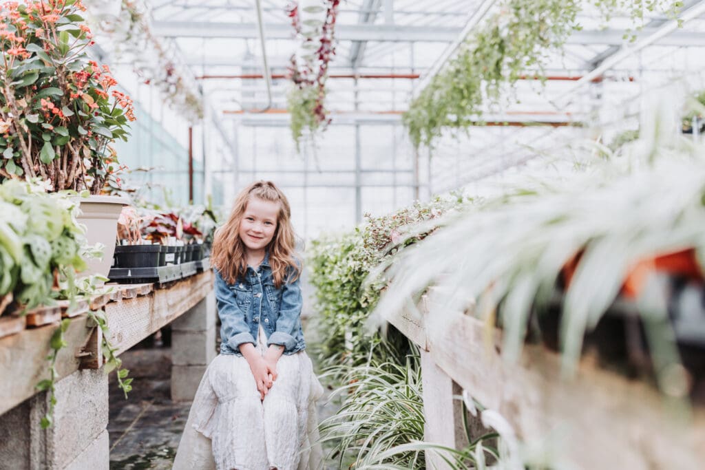Young child smiling during a candid lifestyle photography session in BC