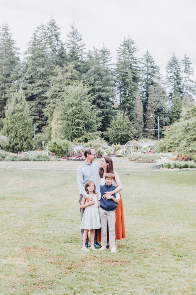 Family vacation photos at the Stanley Park Rose Garden in Vancouver