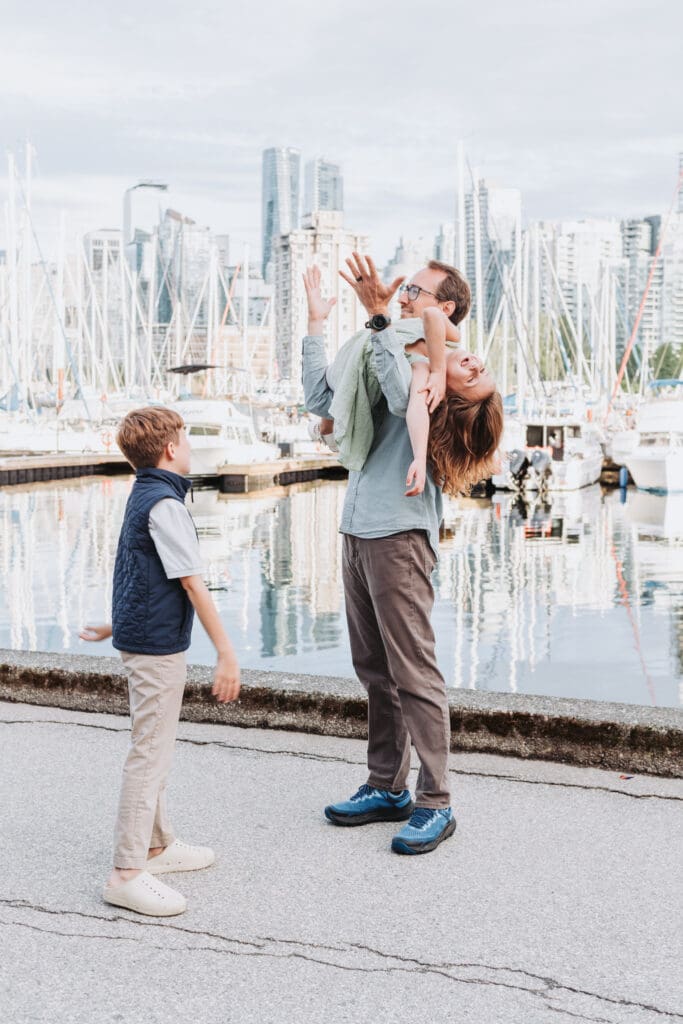 Candid family vacation photo along the Stanley Park Seawall