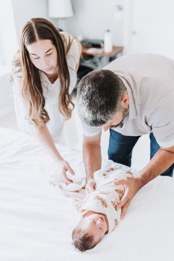 Light and airy newborn family photos in a Surrey home. Lifestyle family photos with toddlers